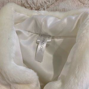 White faux fur coat
